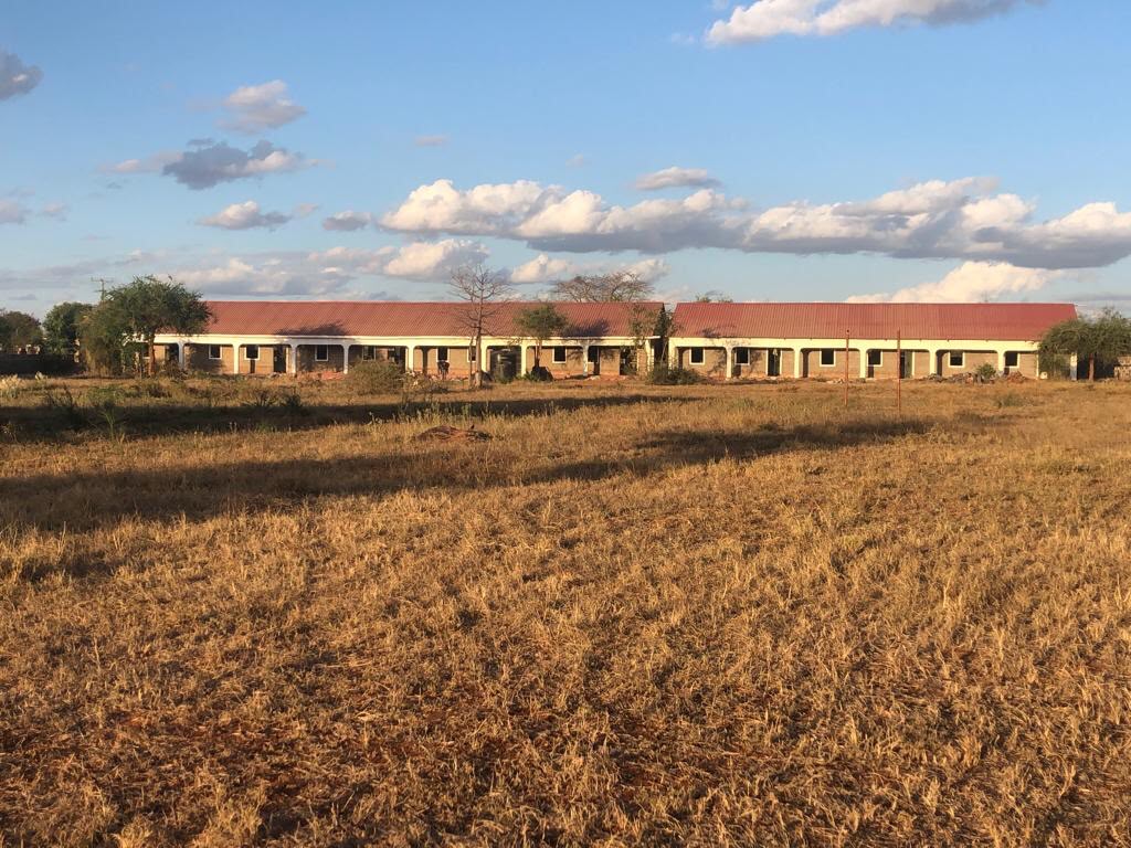 A completed dormitory at sunset