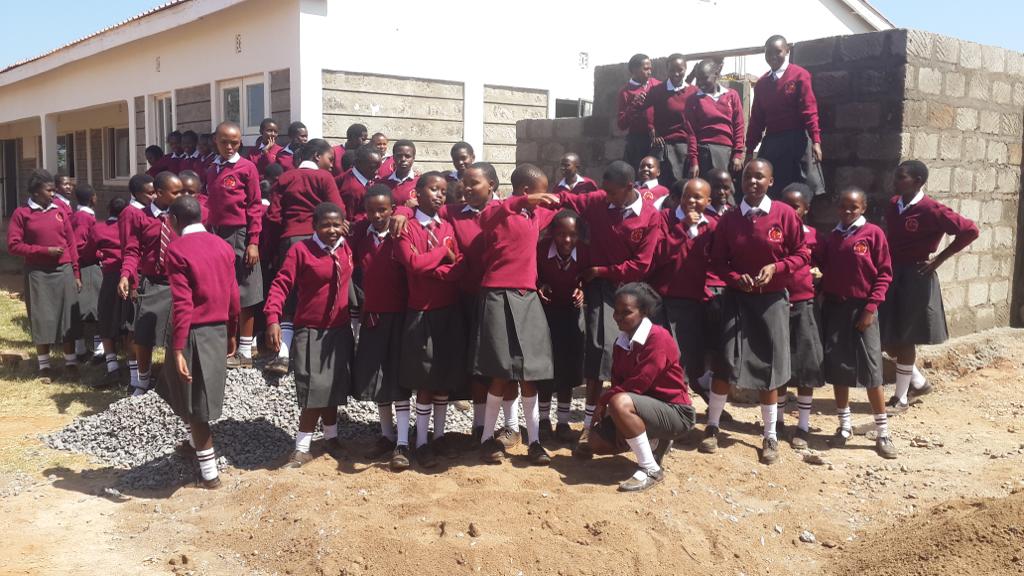 Girls outside the new building